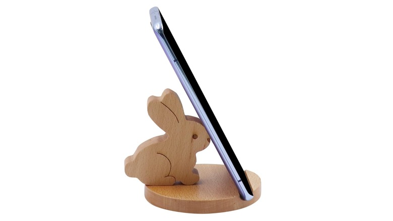 wooden rabbit phone stand