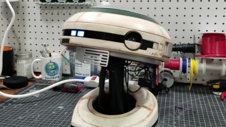 L3-37 home assistant droid head on work table