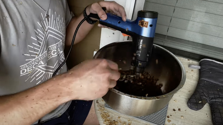 Roasting coffee with heat gun in dog bowl