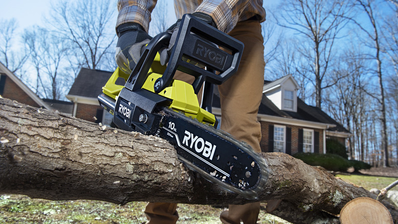 40V 10-inch Chainsaw cutting a log