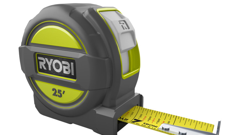 Tape measure on white background