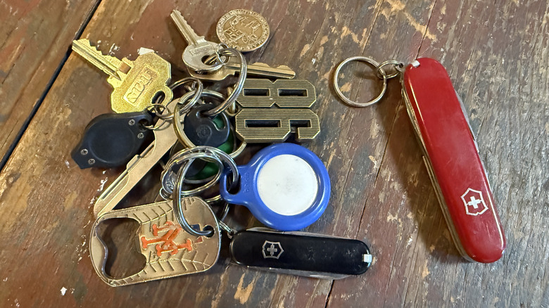 Victorinox Tinker beside Classic SD attached to set of keys