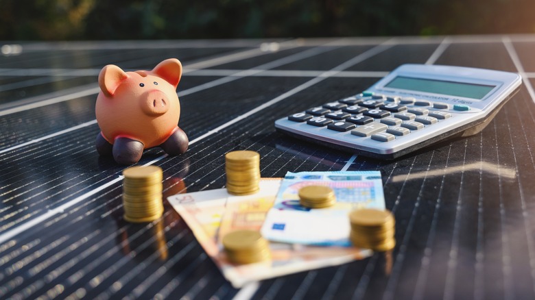 money calculator on solar panel