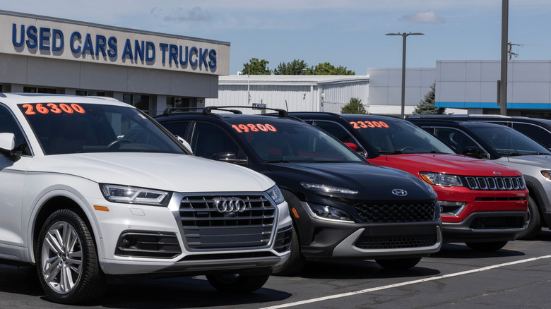 Cars lined up for sale at a dealership