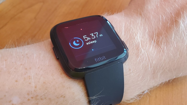 Fitbit on person's wrist