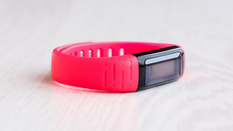 Red Fitbit on table