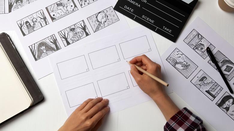 artist drawing storyboards