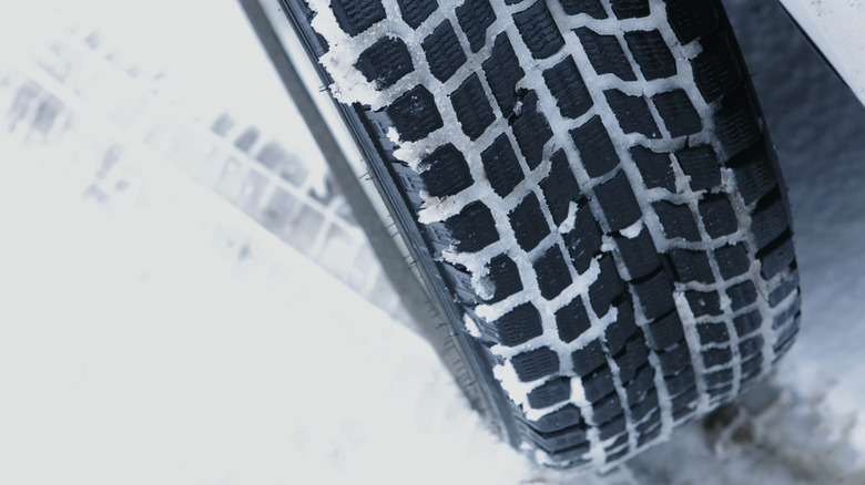 Tire sitting in the snow