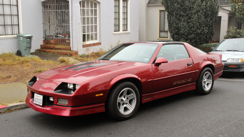 Red Camaro IROC Z parked