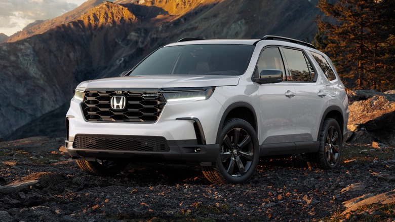 white 2025 Honda Pilot Black Edition in mountains