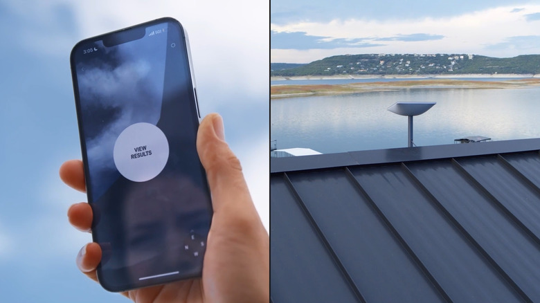 Hand holding phone with Starlink app next to Starlink dish