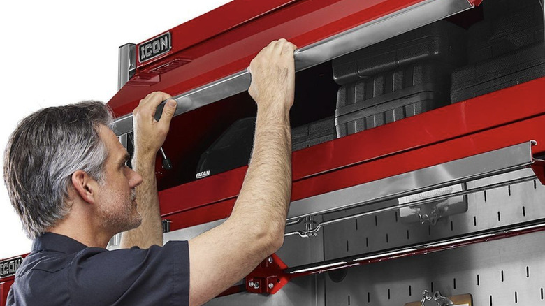 Person using red Icon Professional Overhead Cab