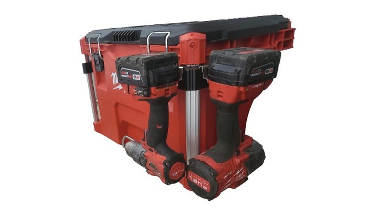 Milwaukee Packout with tools hanging on the side and a white background