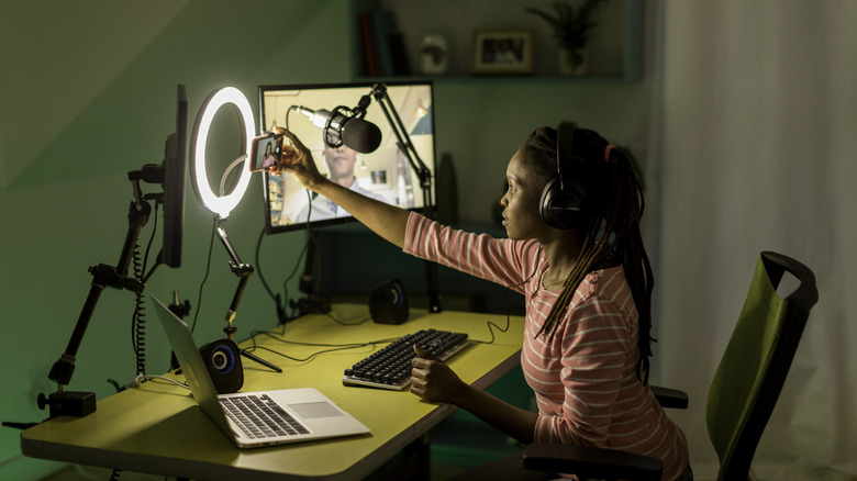 vlogger with set up on desk