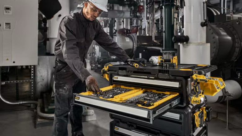 Man opening a DeWalt toolbox