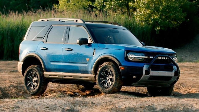 blue 2025 Ford Bronco Sport driving off-road