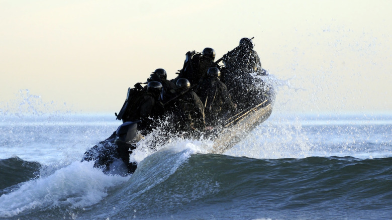 Navy Seals jumping a boat