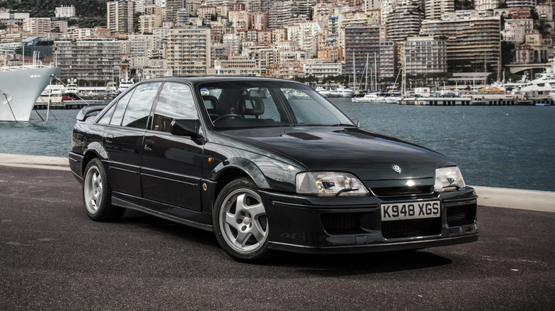 The Vauxhall Lotus Carlton at a port, front 3/4 view