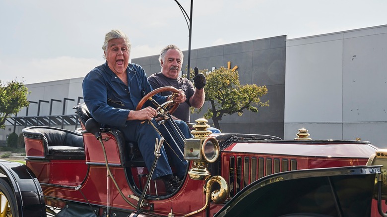 Jay Leno and passenger in a Stanley Steamer Vanderbilt Cup Racer