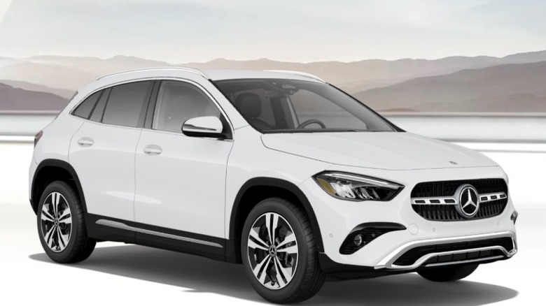 White 2025 Mercedes-Benz GLA-Class parked with mountains in the background