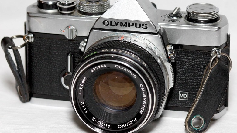 Olympus OM-1 camera with 50mm lens