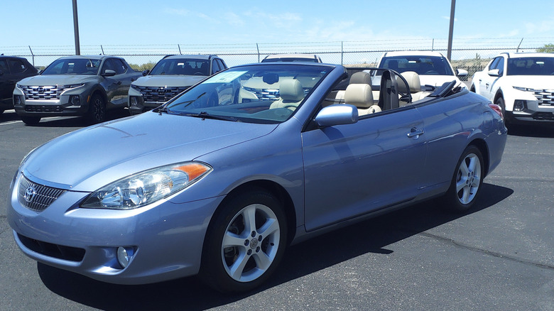 Blue 2006 Toyota Camry Solara SLE convertible parked in lot