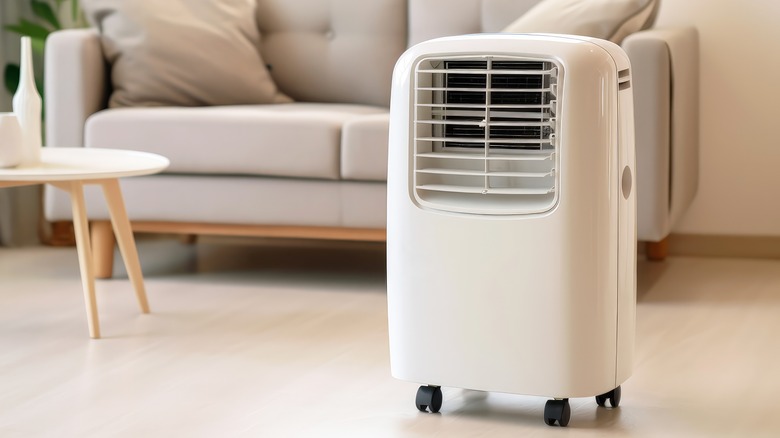 Portable air conditioner in a living room.