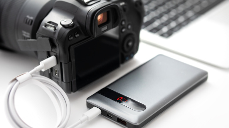 DSLR camera charging on a power bank