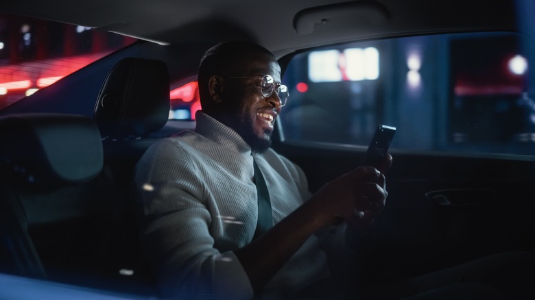 Man happily commuting home from work