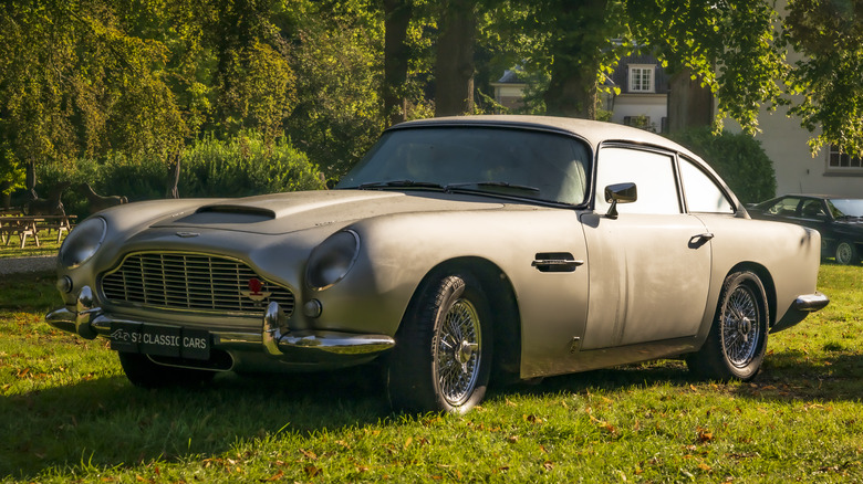 Aston Martin DB5 in a field