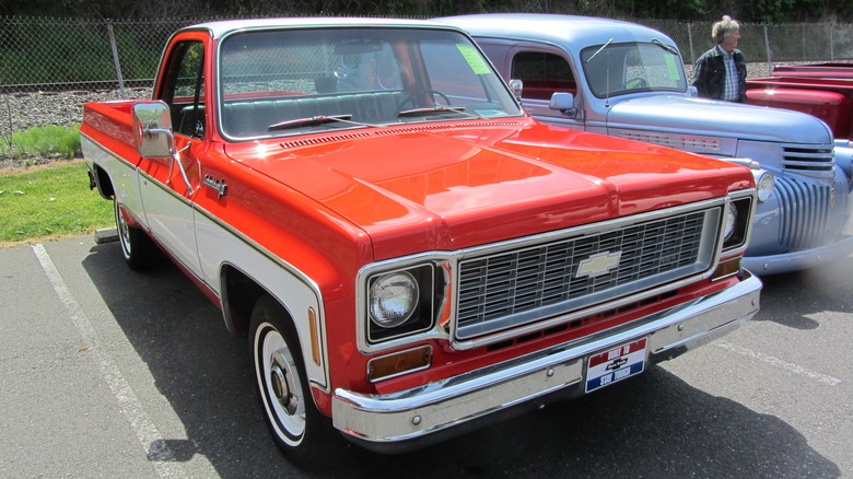 Orange square body Chevrolet truck