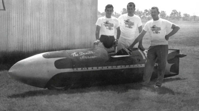 Triumph Devil's Streamliner parked with crew