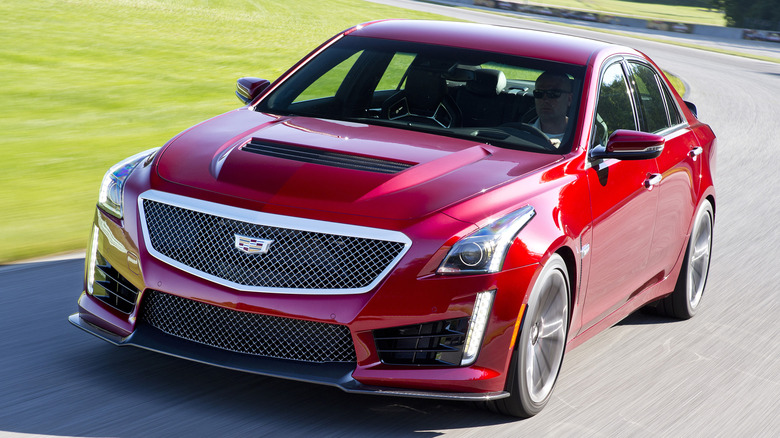 red 2016 Cadillac CTS-V driving on track