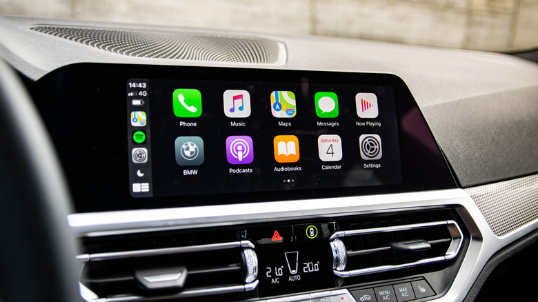 CarPlay capable head unit installed in dashboard.