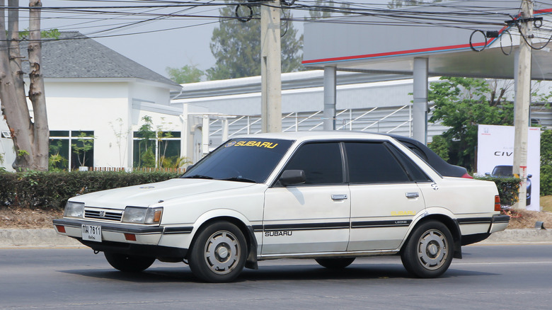 A white Subaru Leone on the move, front 3/4 view