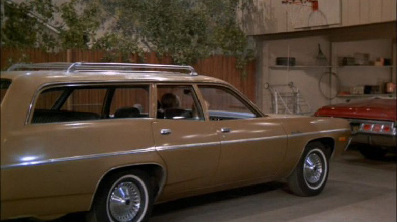 Brady Bunch brown station wagon parked