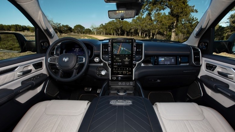 2025 Ram 1500 Tungsten interior showing dual infotainment screens