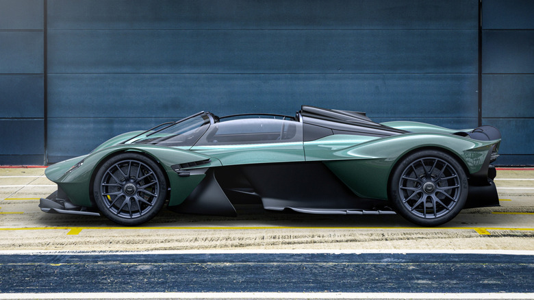 Side-view of a dark green Aston Martin Valkyrie Spider