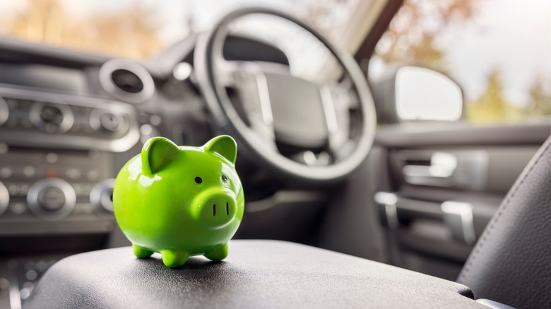 piggy bank on car console