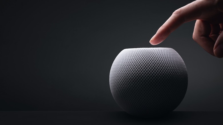 Apple HomePod Mini being used