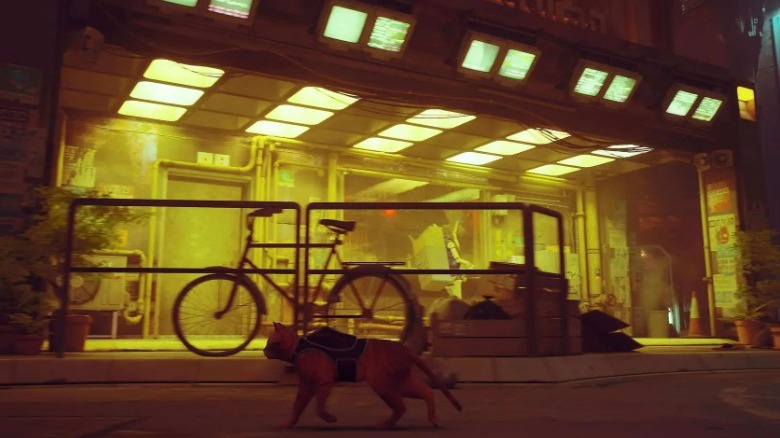 an orange cat walking through a cityscape in "Stray."