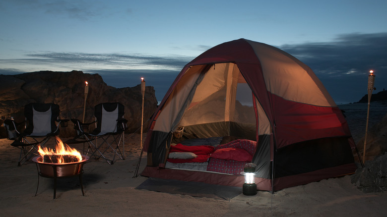 Tent with door open at night