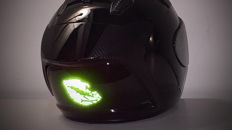 Neon kiss sticker on helmet