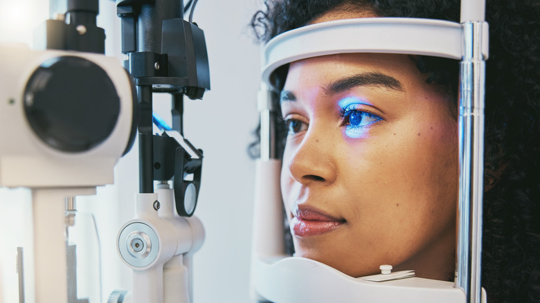 Woman taking eye exam