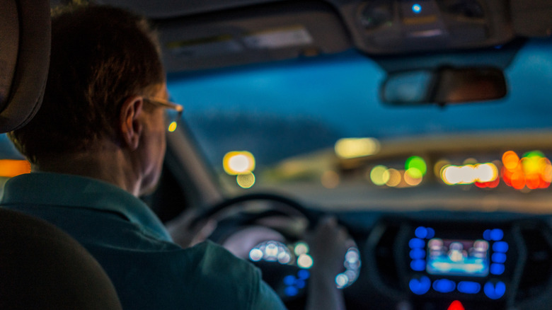 Man driving at night