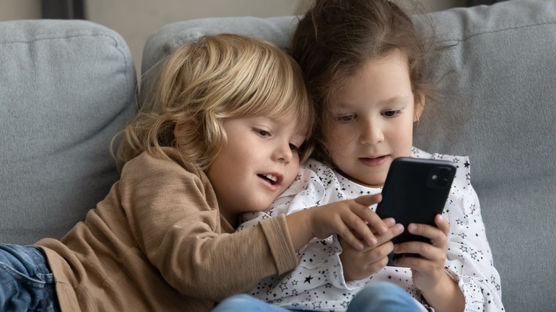 Children use smartphone at home