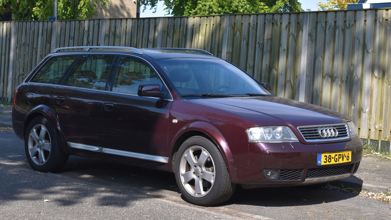 A dark red C5 Audi Allroad, front 3/4 view