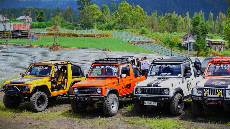 Off-roading classic modded Jeeps on display