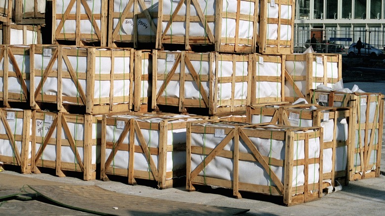 Nondescript mystery crates stacked on a loading dock