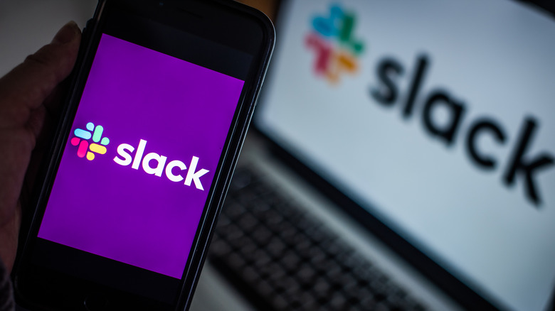 Slack on a smartphone and laptop